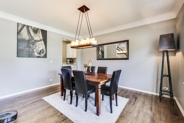 2301 Bluewater Dr, Wauconda, IL 60084 - dining room with dark wood-type flooring and crown molding