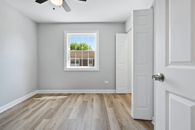 676 Cleo Ct Unit 676, Wheeling, IL 60090 - unfurnished bedroom featuring wood finished floors and ceiling fan