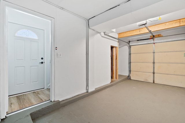 676 Cleo Ct Unit 676, Wheeling, IL 60090 - garage featuring a garage door opener