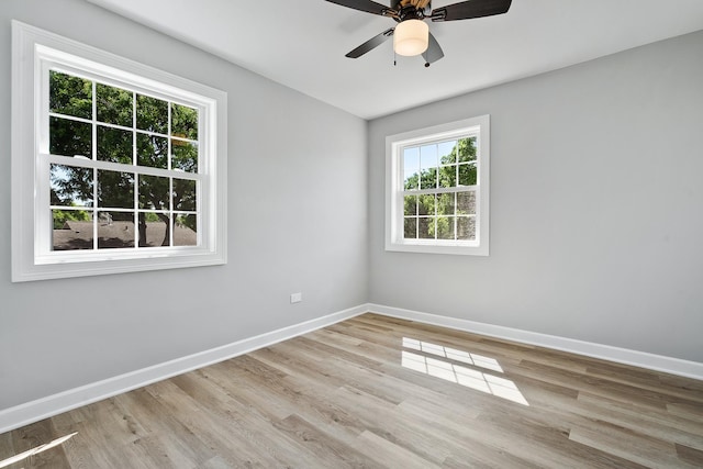 676 Cleo Ct Unit 676, Wheeling, IL 60090 - empty room with wood finished floors and ceiling fan