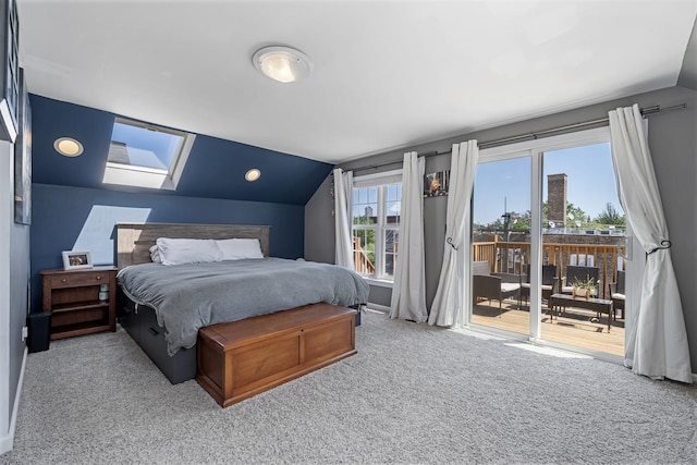 3251 N Racine Ave Unit 3, Chicago, IL 60657 - bedroom with access to exterior, a skylight, carpet floors, and lofted ceiling