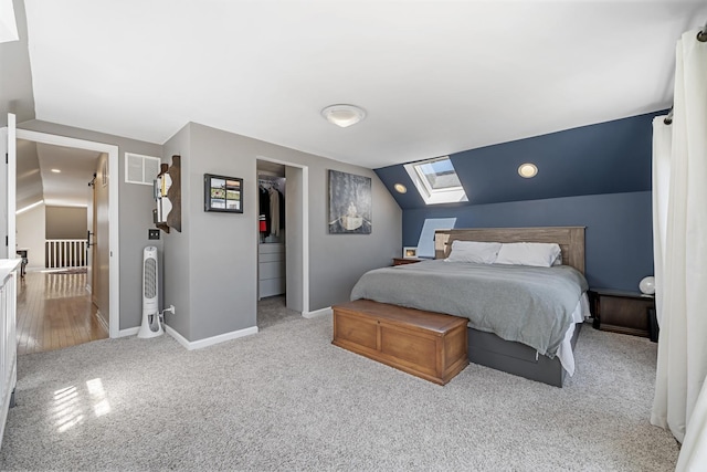 3251 N Racine Ave Unit 3, Chicago, IL 60657 - carpeted bedroom with a skylight, lofted ceiling, a closet, and a walk in closet