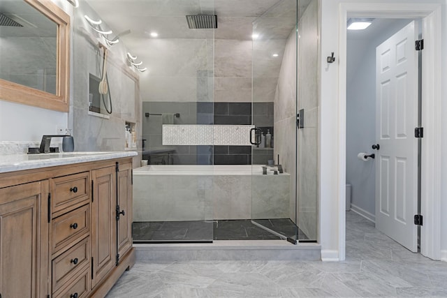 3251 N Racine Ave Unit 3, Chicago, IL 60657 - full bathroom featuring vanity, a stall shower, a bath, and marble finish flooring