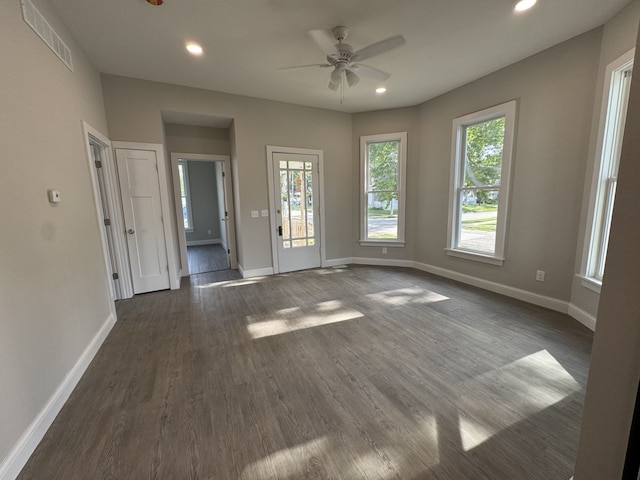 207 W Graham St, Bloomington, IL 61701 - spare room with a ceiling fan, plenty of natural light, dark wood-style floors, and recessed lighting