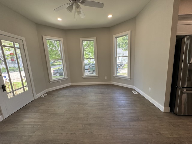 207 W Graham St, Bloomington, IL 61701 - unfurnished dining area featuring a ceiling fan, plenty of natural light, dark wood-style flooring, and recessed lighting