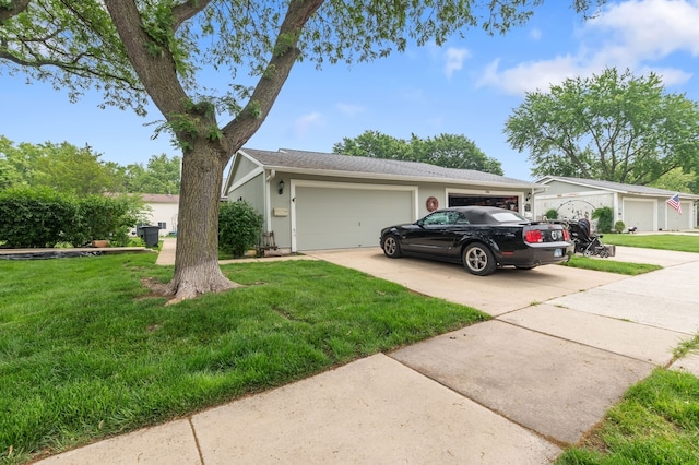 2658 Sumac St, Woodridge, IL 60517 - view of front facade with concrete driveway, a front lawn, and an attached garage