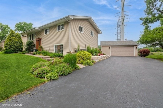 2S200 Valley Rd, Lombard, IL 60148 - view of property exterior featuring an outbuilding, a lawn, and a detached garage