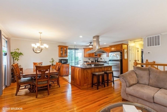 2S200 Valley Rd, Lombard, IL 60148 - living area featuring light wood finished floors, a chandelier, crown molding, and a ceiling fan