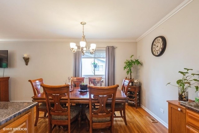 2S200 Valley Rd, Lombard, IL 60148 - dining room with a chandelier, light wood finished floors, and ornamental molding