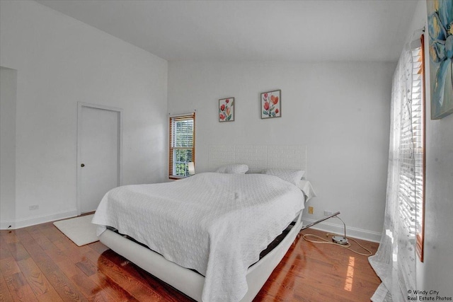 1505 Della Dr, Hoffman Estates, IL 60169 - bedroom featuring vaulted ceiling and wood finished floors