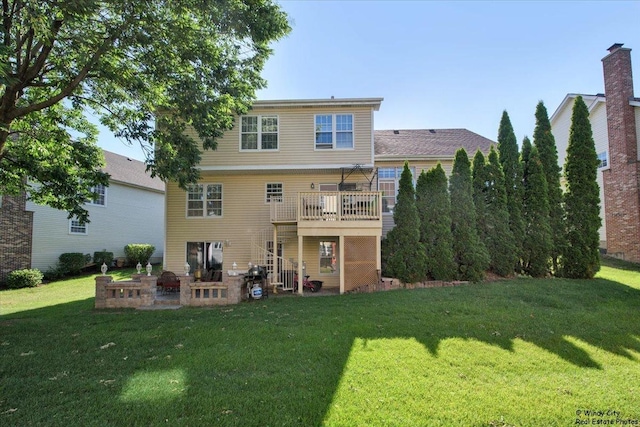 1505 Della Dr, Hoffman Estates, IL 60169 - back of house with a patio and a lawn