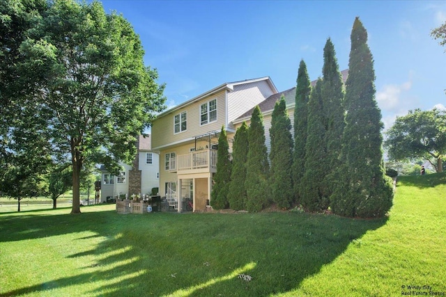 1505 Della Dr, Hoffman Estates, IL 60169 - back of house featuring a yard