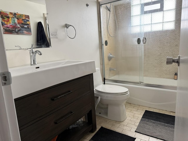 9513 Kelvin Ln Unit 2111, Schiller Park, IL 60176 - bathroom featuring vanity, combined bath / shower with glass door, and tile patterned floors