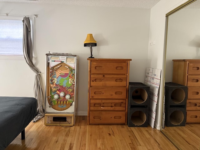 9513 Kelvin Ln Unit 2111, Schiller Park, IL 60176 - bedroom with light wood-style floors