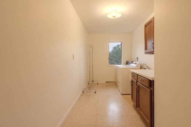 921 Cassie Dr, Joliet, IL 60435 - laundry area with cabinet space and washing machine and dryer