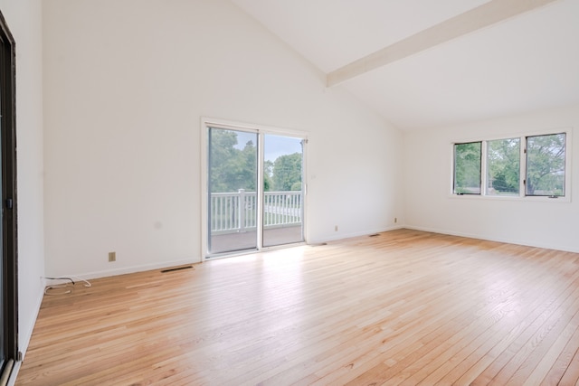 921 Cassie Dr, Joliet, IL 60435 - spare room with light wood-style floors, high vaulted ceiling, and beamed ceiling