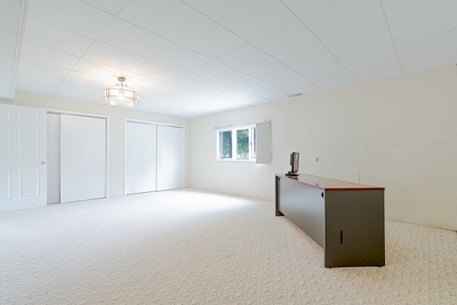 921 Cassie Dr, Joliet, IL 60435 - basement featuring carpet flooring and a paneled ceiling
