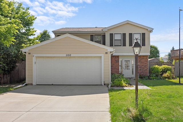 1100 Singleton Dr, Roselle, IL 60172 - view of front of home featuring concrete driveway, a garage, and brick siding