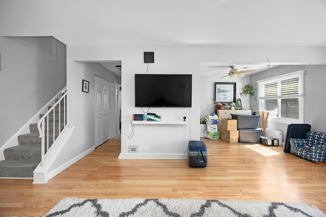 1100 Singleton Dr, Roselle, IL 60172 - living area featuring wood finished floors, stairway, and ceiling fan