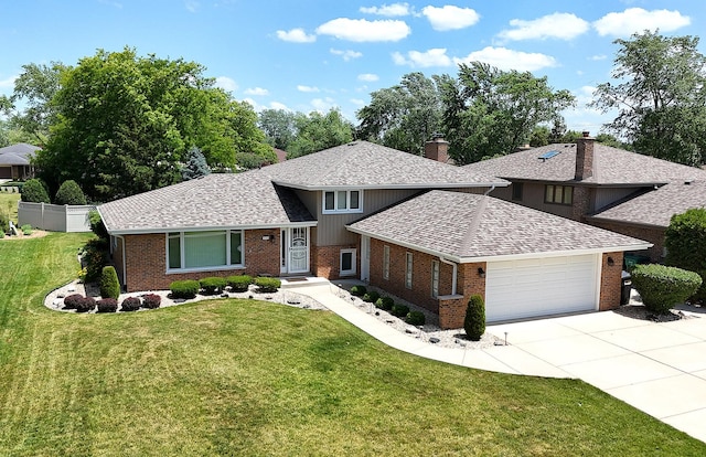 15363 Sunflower Ct, Orland Park, IL 60462 - split level home with brick siding, a chimney, an attached garage, and a shingled roof