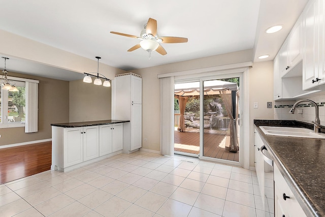 15363 Sunflower Ct, Orland Park, IL 60462 - kitchen featuring a ceiling fan, plenty of natural light, white cabinetry, decorative light fixtures, and recessed lighting