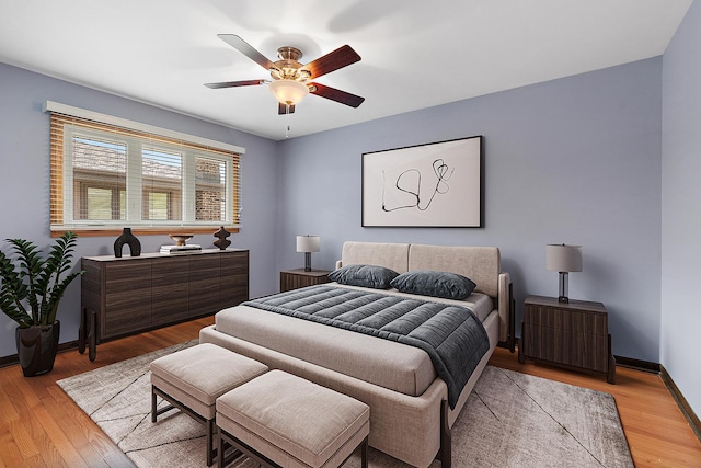 15363 Sunflower Ct, Orland Park, IL 60462 - bedroom with light wood finished floors and ceiling fan