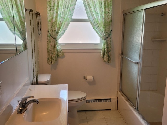 16030 Gauger Ave, Harvey, IL 60426 - bathroom featuring baseboard heating, tile patterned flooring, shower / bath combination with glass door, and vanity
