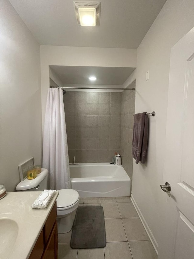 3630 N Harlem Ave Unit 407, Chicago, IL 60634 - bathroom featuring tile patterned flooring, vanity, and shower / tub combo with curtain