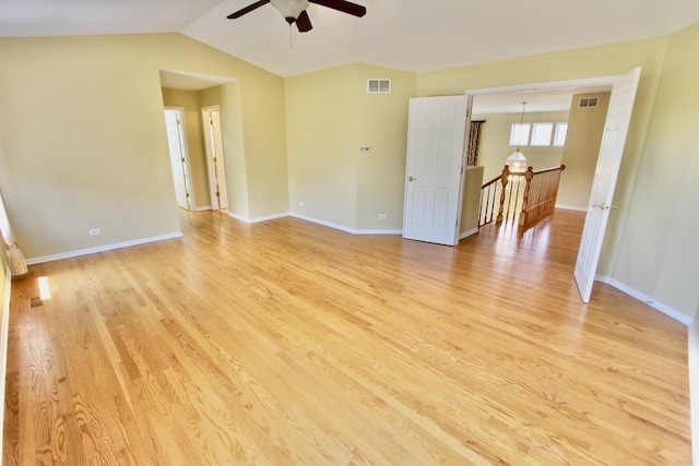 18737 W Ash Dr, Lake Villa, IL 60046 - empty room with ceiling fan, light wood finished floors, and vaulted ceiling