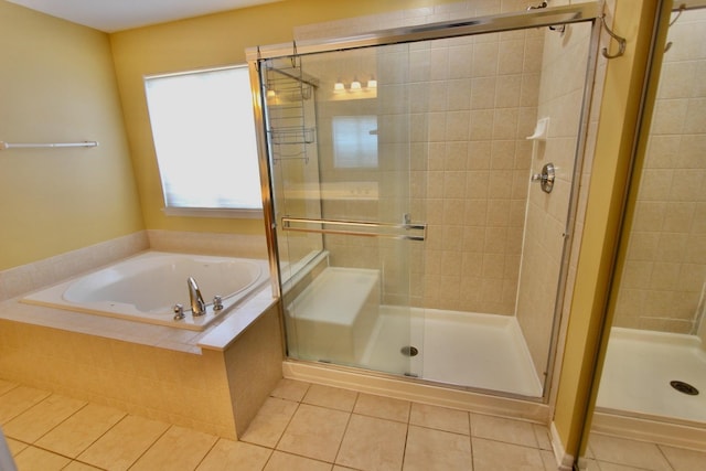 18737 W Ash Dr, Lake Villa, IL 60046 - bathroom featuring tile patterned flooring, a stall shower, and a bath