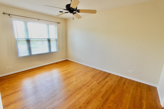 18737 W Ash Dr, Lake Villa, IL 60046 - unfurnished room featuring light wood finished floors and a ceiling fan