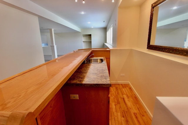 18737 W Ash Dr, Lake Villa, IL 60046 - indoor bar with light wood-style flooring and baseboards