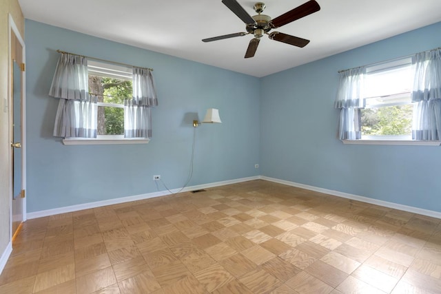534 Grosvener Ln, Elk Grove Village, IL 60007 - unfurnished room featuring baseboards and ceiling fan
