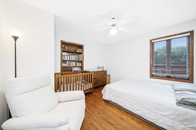 5821 W 127th St, Palos Heights, IL 60463 - bedroom with wood finished floors and ceiling fan