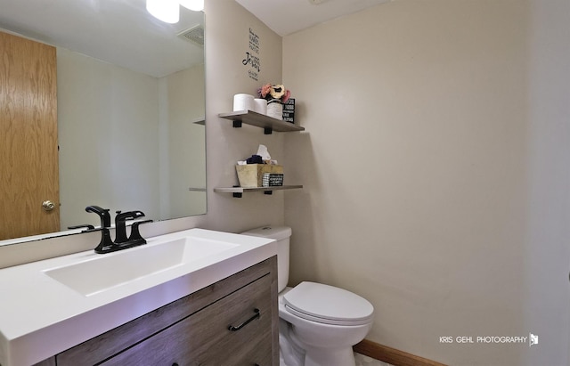 2227 N Quaker Hollow Ln, Round Lake Beach, IL 60073 - bathroom with vanity and toilet