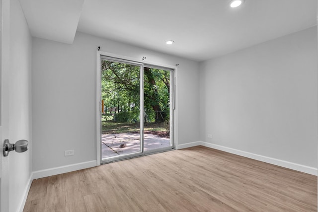 1549 Revere Cir, Schaumburg, IL 60193 - empty room featuring wood finished floors and recessed lighting