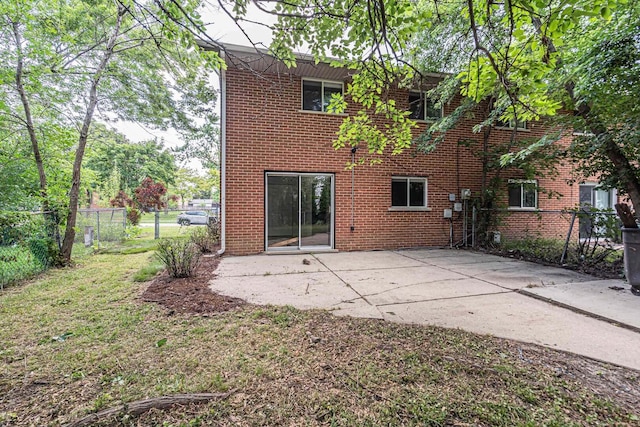 1549 Revere Cir, Schaumburg, IL 60193 - rear view of property featuring a patio and brick siding
