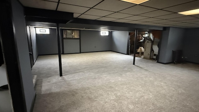 18316 Sherman St, Lansing, IL 60438 - basement with carpet floors, a paneled ceiling, and plenty of natural light