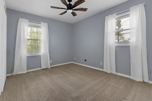 215 S Park Blvd, Streamwood, IL 60107 - carpeted spare room with ceiling fan and baseboards