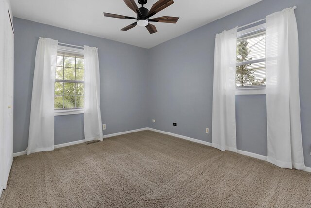 215 S Park Blvd, Streamwood, IL 60107 - empty room featuring a ceiling fan and carpet floors