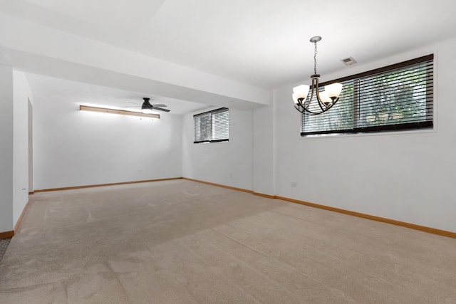 215 S Park Blvd, Streamwood, IL 60107 - spare room with healthy amount of natural light, carpet, and a chandelier