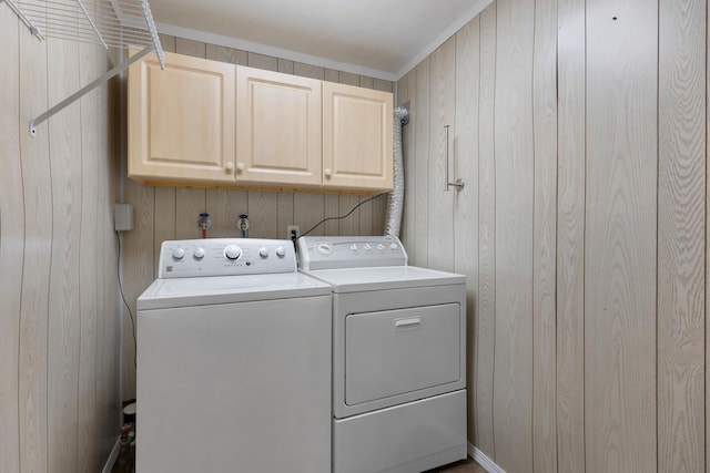 215 S Park Blvd, Streamwood, IL 60107 - washroom with cabinet space, separate washer and dryer, and wooden walls