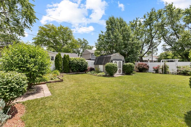 215 S Park Blvd, Streamwood, IL 60107 - fenced backyard with a storage unit