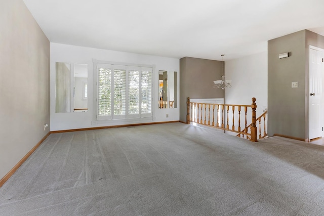 215 S Park Blvd, Streamwood, IL 60107 - spare room featuring a chandelier and carpet