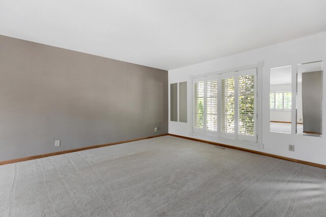 215 S Park Blvd, Streamwood, IL 60107 - carpeted spare room featuring baseboards