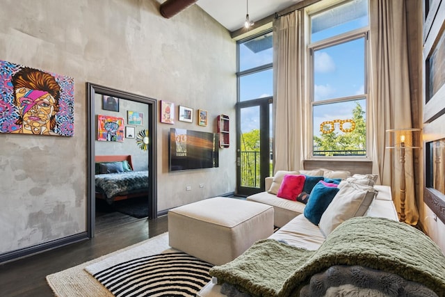 1215 W Gunnison St Unit 202, Chicago, IL 60640 - living room with a high ceiling and wood finished floors
