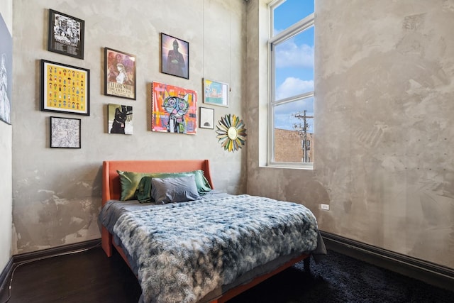 1215 W Gunnison St Unit 202, Chicago, IL 60640 - bedroom featuring baseboards and wood finished floors