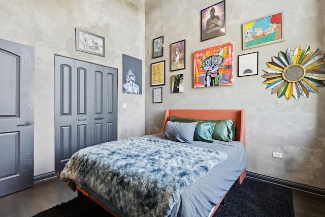 1215 W Gunnison St Unit 202, Chicago, IL 60640 - bedroom featuring wood finished floors and a closet