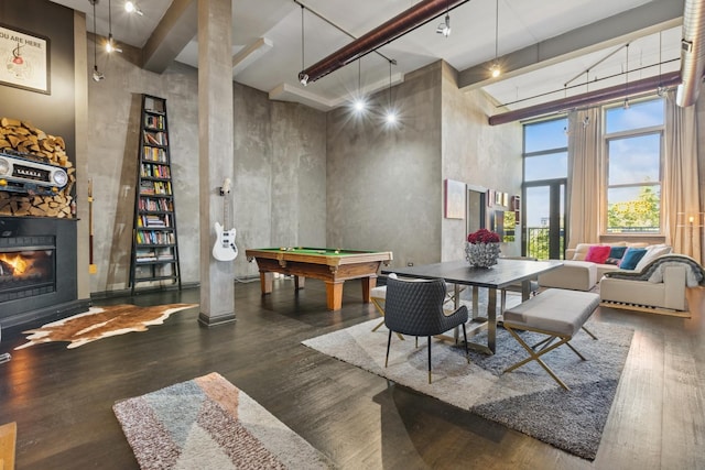 1215 W Gunnison St Unit 202, Chicago, IL 60640 - game room featuring wood finished floors, billiards, a glass covered fireplace, and a high ceiling
