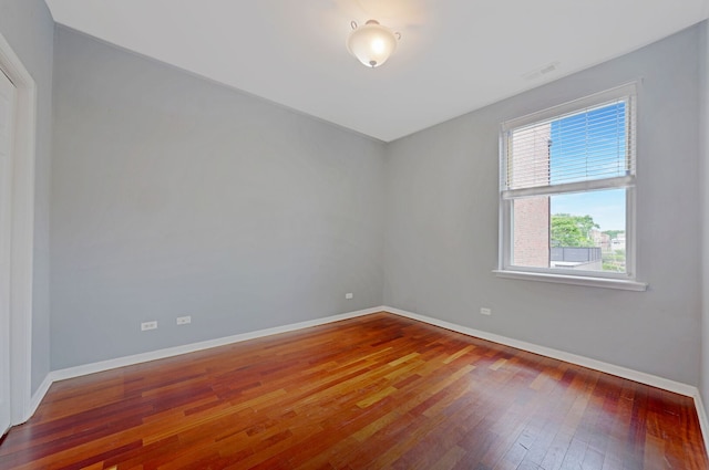 3002 W Montrose Ave Unit 2A, Chicago, IL 60618 - unfurnished room with hardwood / wood-style floors and baseboards
